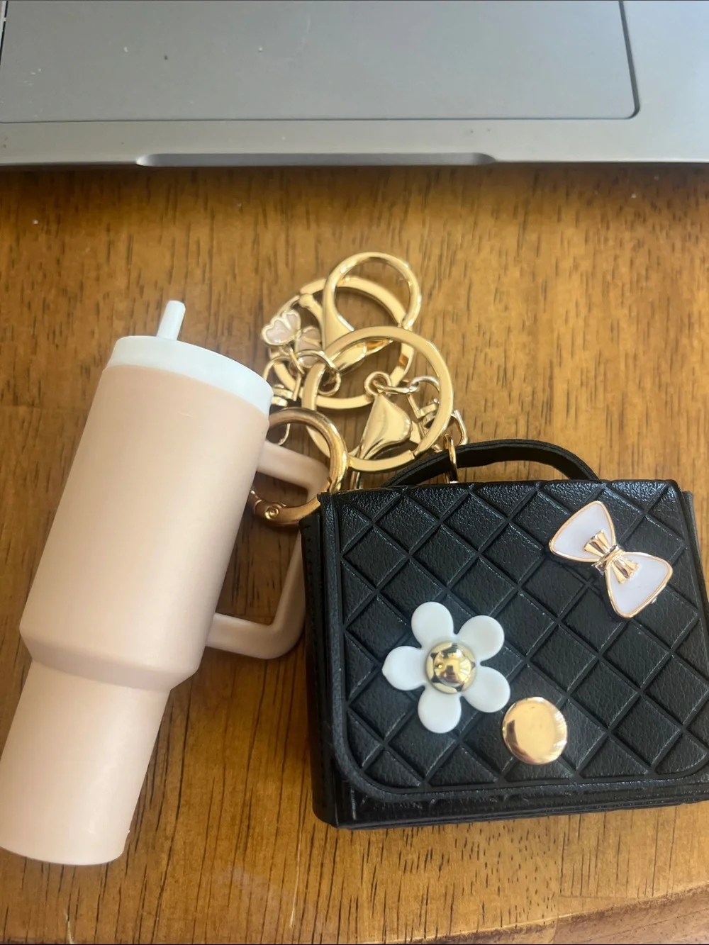 Black Quilted Mini Purse Keychain with Gold Accents and Pink Tumbler Charm